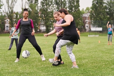 Women playing football in West Berkshire