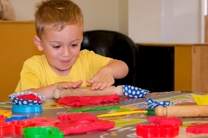 A photograph of a child playing at one of our Family Hubs.