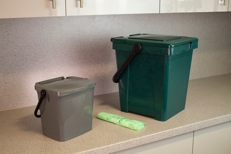 Food caddies and bags Food caddies and bags on a kitchen work top