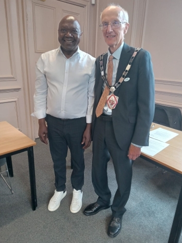 Tony Vickers and Collins Maisiri, founder of Angels Outreach CIC