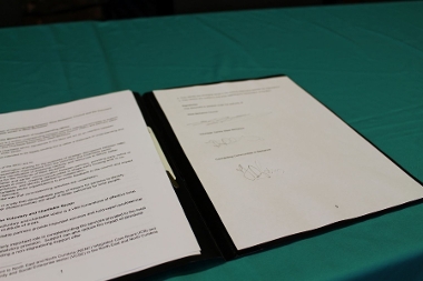 The signed Memorandum of Understanding (MOU) document.
